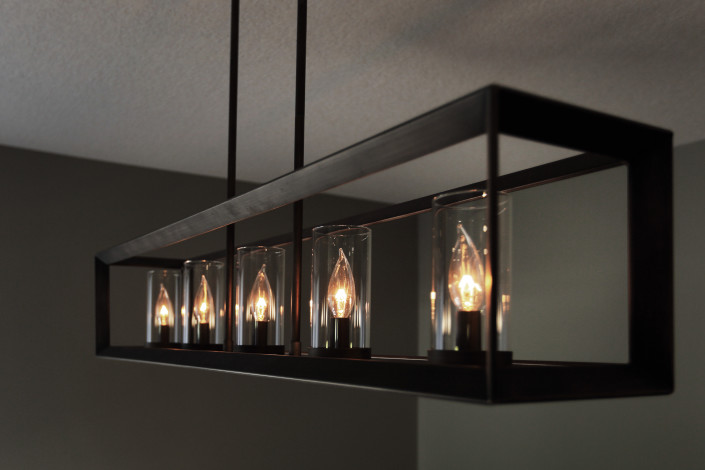 length-wise dining room table hanging fixture. On a dimmer switch for perfect ambiance! By House of J Interior Design. Edmonton, Alberta.